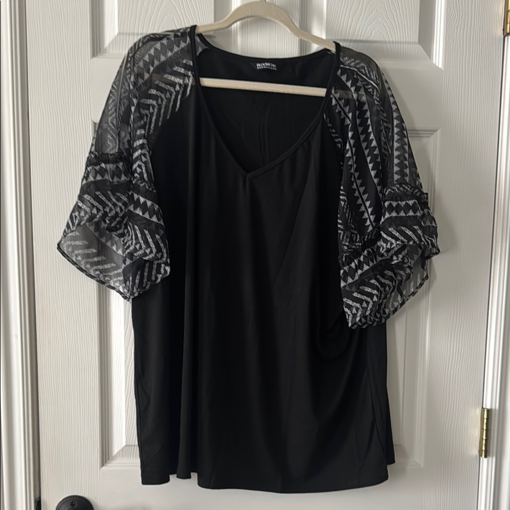 BloomChic Black Top with Patterned Sheer Sleeves
